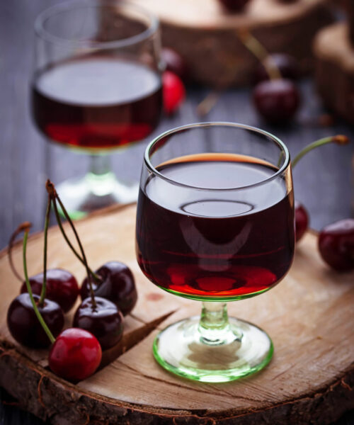 Glasses of cherry liquor. Selective focus